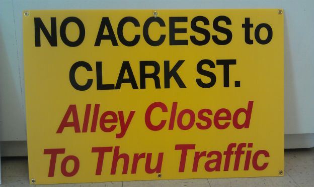 DeJames Construction Inc.  Informational temporary Cor-x construction signs with brass grommets for hanging on fence.